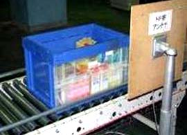 写真6. プラスチックコンテナ搬送読取り実験